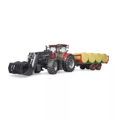 Case IH Optum 300 CVX homlokrakodóval és pótkocsival